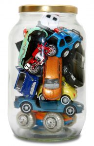Coloured cars in a jar